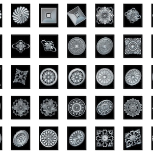 May include: A set of 36 silver-toned metal decorative embellishments with various geometric and floral designs. The embellishments are arranged in a grid pattern on a black background.