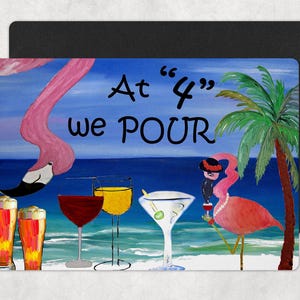May include: A rectangular magnet featuring a whimsical painting of pink flamingos, cocktails, and a palm tree against a blue ocean backdrop. The text "At 4 we POUR" is displayed on the magnet.