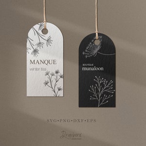 May include: Two black and white printable gift tags with floral designs. The tag on the left says "MANQUE winter tea". The tag on the right says "BOUTIQUE munaloon".