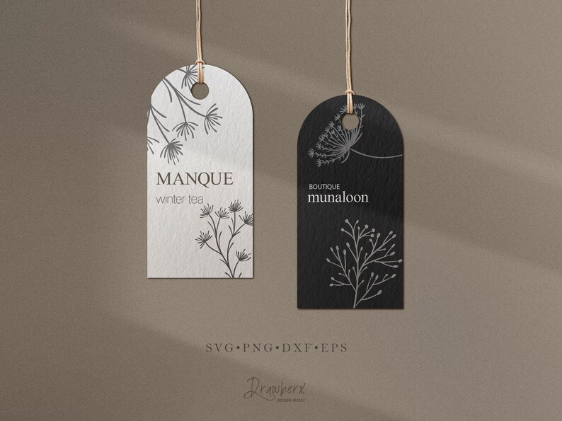 May include: Two black and white printable gift tags with floral designs. The tag on the left says "MANQUE winter tea". The tag on the right says "BOUTIQUE munaloon".