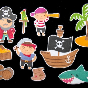 May include: A set of colorful felt pirate themed cutouts, including a pirate ship, a pirate with an eye patch, a parrot, a treasure chest, a palm tree, a shark, and two barrels.