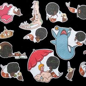May include: A set of 13 colorful stickers featuring a variety of sea creatures, including a shark, a crab, a seahorse, and a mermaid. The stickers are perfect for adding a touch of whimsy to your planner, laptop, or water bottle.