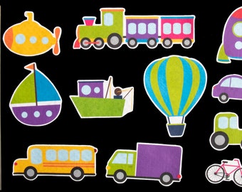 May include: A set of 11 colorful felt cutouts of different vehicles, including a train, a hot air balloon, a submarine, a sailboat, a car, a truck, a school bus, a tractor, a rocket, and a fishing boat.