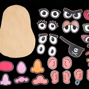 Puede incluir: Una forma de patata de fieltro marrón con varios rasgos faciales de fieltro, incluidos ojos, narices, bocas, orejas, cejas y un parche de ojo de pirata.