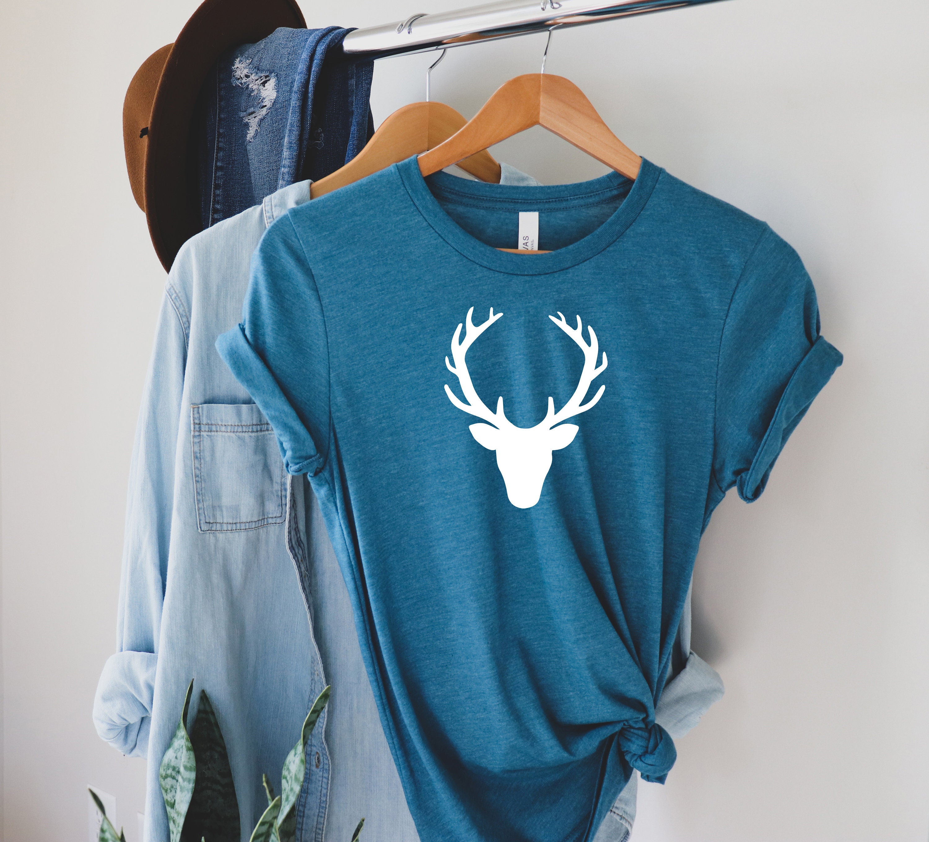 deer logo brand shirt