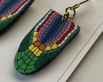 Pendientes con punta de raíz de planta