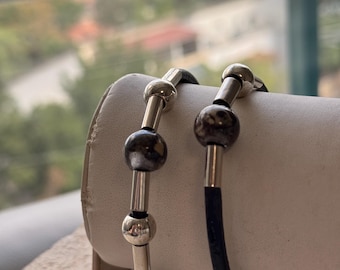 Stainless Steal Black Leather bracelet with Sea of Galilee bead