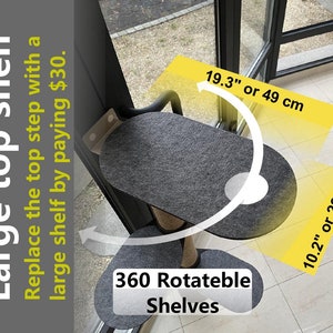 K&ouml;nnte beinhalten: Ein graues Katzenbaumregal mit einem Durchmesser von 49 cm und einem Durchmesser von 26 cm. Das Regal ist um 360 Grad drehbar. Der Text "360 Rotateble Shelves" ist auf dem Regal aufgedruckt.