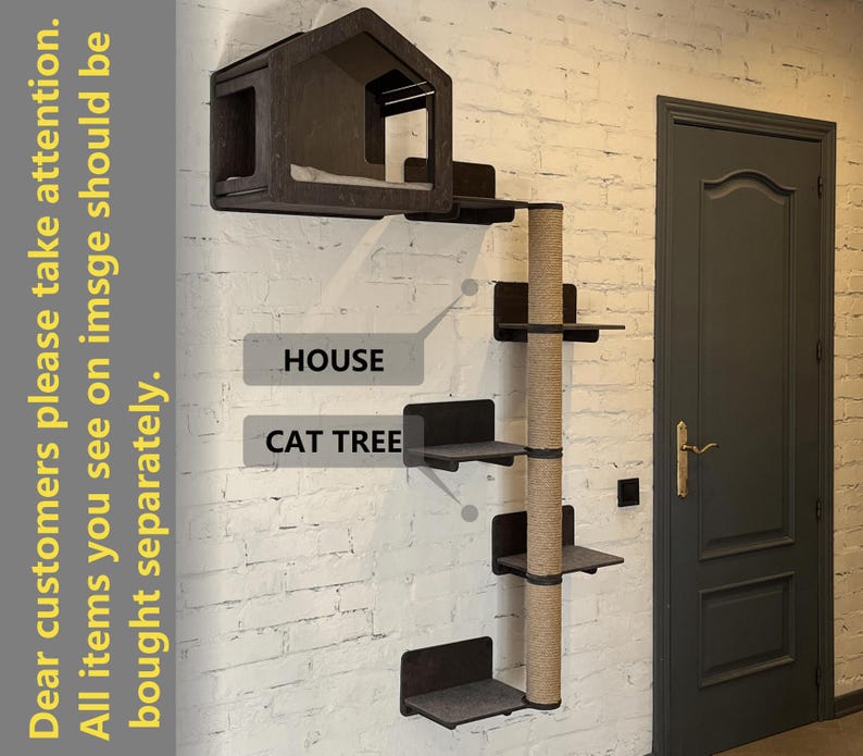 May include: A black cat tree with a house on top and multiple platforms. The cat tree is mounted on a white brick wall. The text "HOUSE" and "CAT TREE" are visible on the wall.