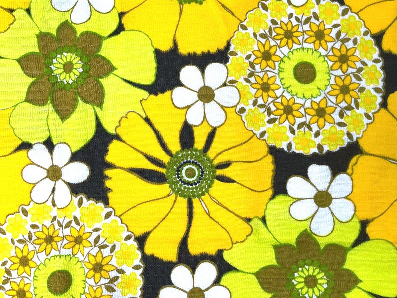 May include: A yellow and green floral fabric with a repeating pattern of large and small flowers. The fabric has a retro 1970s style.