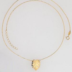 14 karat yellow gold monstera leaf necklace