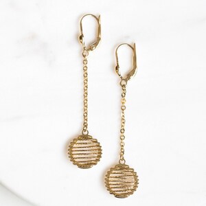 Pendientes colgantes de oro amarillo de 14 quilates