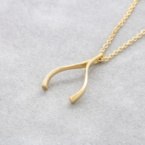 14 karat yellow gold wishbone necklace