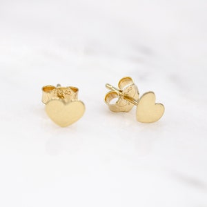 14 karat yellow gold tiny heart stud earrings