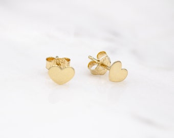 14 karat yellow gold tiny heart stud earrings