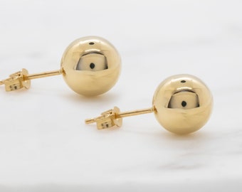 Orecchini a bottone a sfera in oro giallo 14 carati