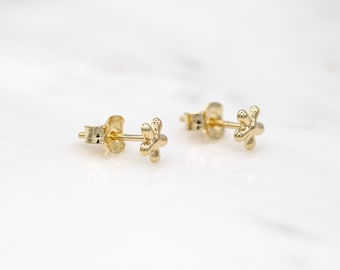 14 karat yellow gold tiny flower stud earrings