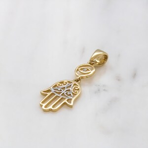 14 karat yellow gold hamsa medallion