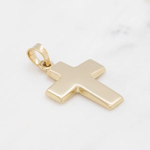 14 karat yellow gold tiny puffy cross pendant