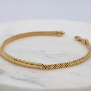 14 karat yellow gold ID bracelet