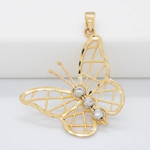 14 karat yellow white gold diamond cut butterfly pendant