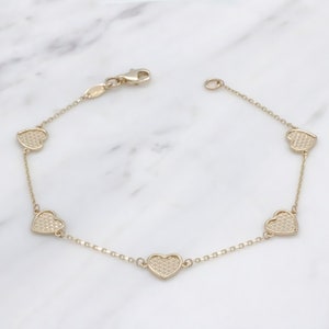 14 karat yellow gold heart bracelet
