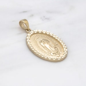 14 karat yellow gold Virgin Mary medallion
