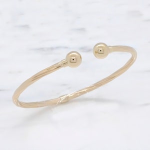14 Karat Gelbgold 8 mm Doppelkugel offener Armreif