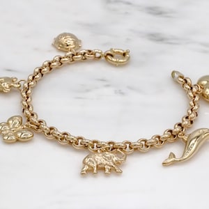 14 karat yellow gold charm bracelet