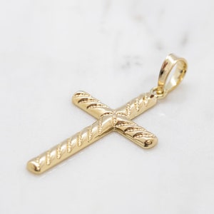 14 karat yellow gold small size textured cross pendant