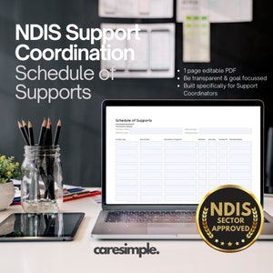 May include: A laptop computer displaying a blank NDIS Support Coordination Schedule of Supports document. The document is a one-page editable PDF, built specifically for Support Coordinators. The laptop is on a white desk with a glass jar of pencils and a tablet computer.