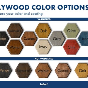Color swatch chart on navy background — ten finish options including teak, rouge, walnut, cypress, rosewood in the top row, plus grey, amber, kraft, and olive below. Real wood grain visible in each swatch. Standard finish selection reference. For the stone-texture cover specifically, the grey swatch in the bottom row most closely represents the Mori cover finish — matte, cool-toned, and distinct from all the warm wood grain options above it in the chart.