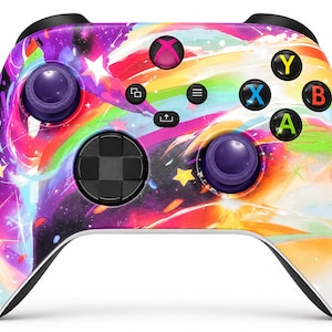 May include: A wireless video game controller featuring a vibrant, multi-coloured abstract design with swirling patterns of pink, purple, orange, and yellow. The faceplate includes white star shapes, black buttons, a black D-pad, and two purple thumbsticks.