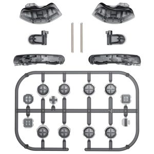 May include: A collection of translucent gray video game controller parts, including buttons, triggers, and directional pads. The components are arranged on a white background, with some parts separated and others still attached to a plastic frame.