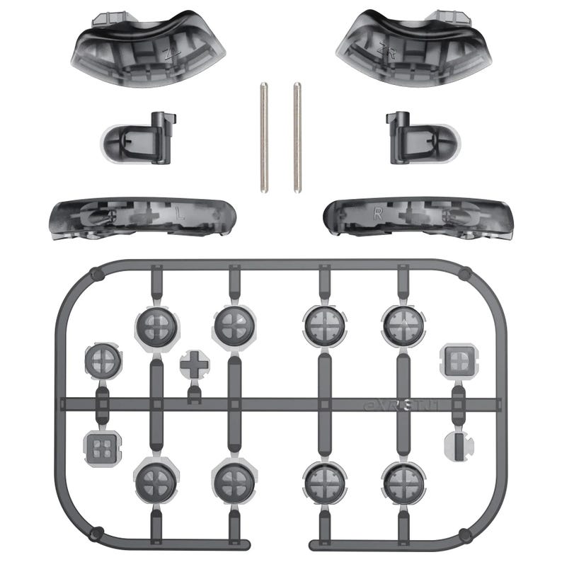 May include: A collection of translucent gray video game controller parts, including buttons, triggers, and directional pads. The components are arranged on a white background, with some parts separated and others still attached to a plastic frame.