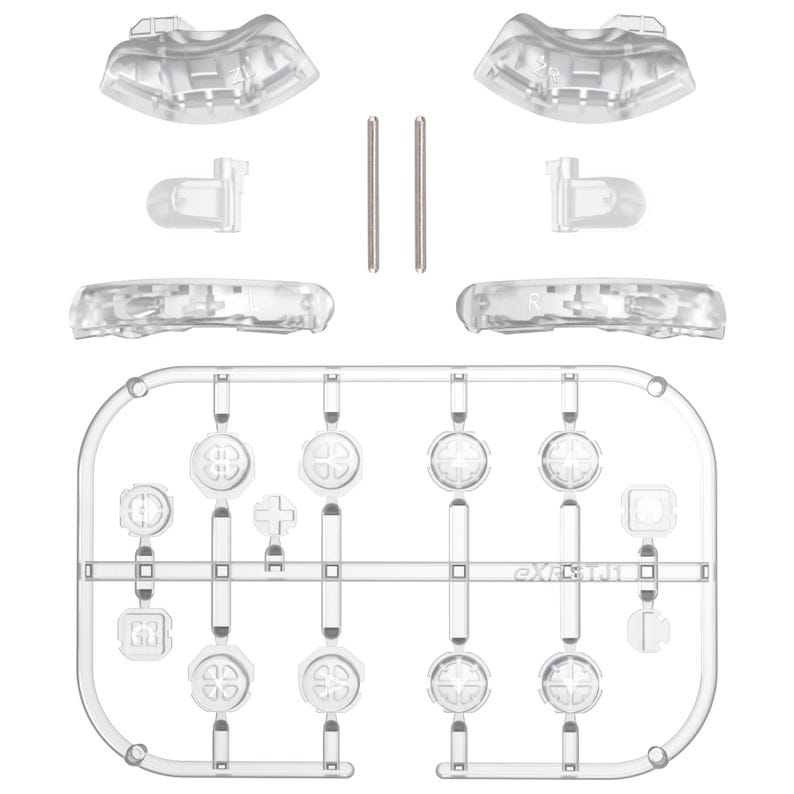 May include: A clear plastic game controller repair kit. The kit includes various buttons, triggers, and other components, along with two silver metal pins. The components are arranged on a clear plastic frame.