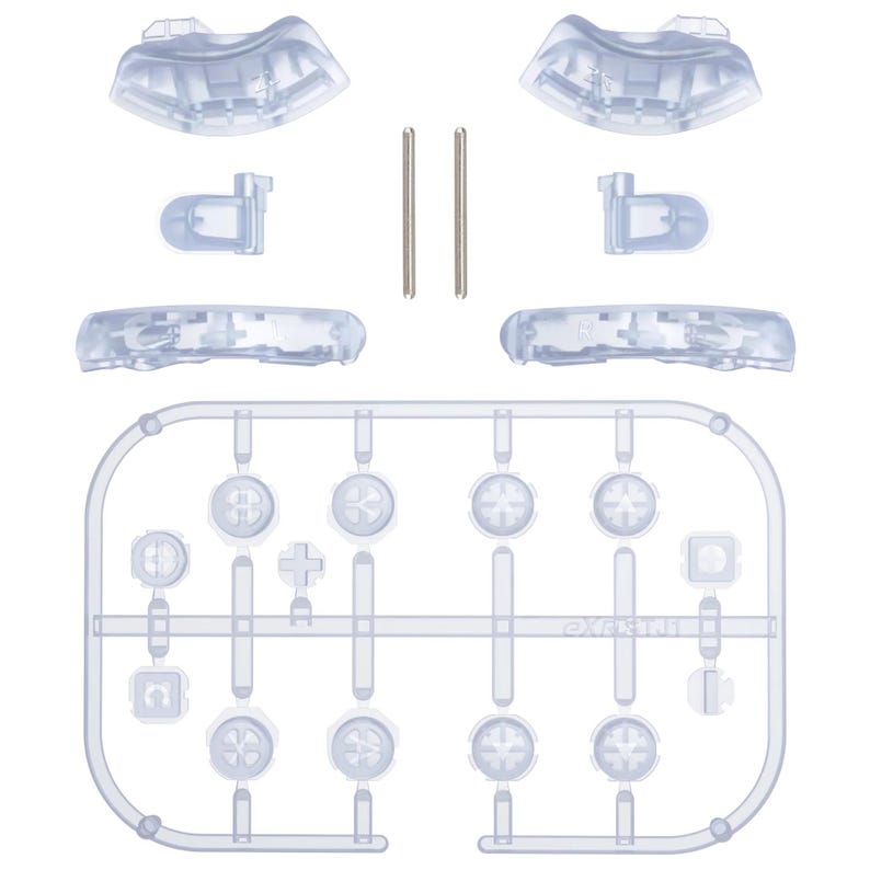 May include: Clear plastic replacement parts for a game controller, including buttons, directional pads, and shoulder buttons. The components are arranged on a white background, with two metal pins.