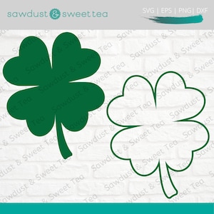 May include: Two green four-leaf clover designs, one filled in and one outlined, on a white brick background. The text "sawdust & sweet tea" is at the top of the image.