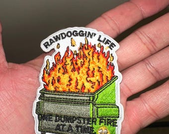 Rawdogging Life Morale Patch – Funny Dumpster Fire Embroidered Patch