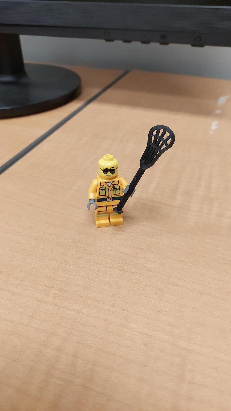 Bâton de crosse Lego image 1