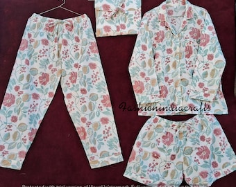 Può includere: Un pigiama bianco con stampa floreale in tonalità rosa, verde e marrone. Il set comprende una camicia a maniche lunghe, pantaloni e pantaloncini.