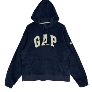 vintage GAP - Sweat à capuche en polaire bleu marine GAP - Sweat-shirt à capuche avec logo classique Taille M