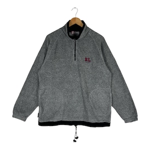May include: A gray heathered fleece pullover with a quarter-zip closure, a black inner collar, and a black hem with an adjustable drawstring. The chest features an embroidered red and black RL Chaps logo, and the interior tag reads Chaps.
