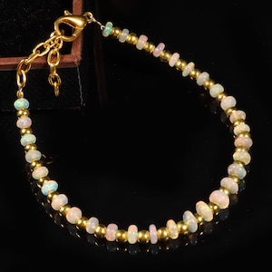 3x5 mm 16.60 Cts Opal bead, Natural Ethiopian opal welo fire rondelle bead bracelet, opal bead bracelet with golden balls