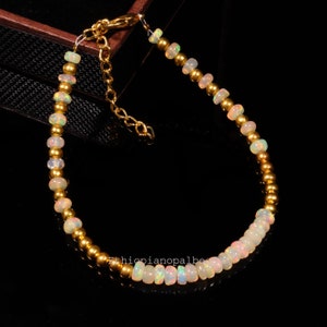 3X4 MM 16.15 Cts Natural ethiopian opal welo fire rondelle bead bracelet 8 Inches, Opal bead bracelet with golden balls, christmas gift