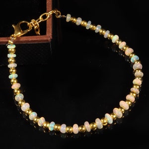 Opal bead, Natural Ethiopian opal welo fire rondelle bead bracelet, opal bead bracelet with golden balls, 3x4 MM 16.00 Cts