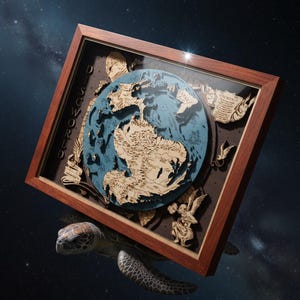 May include: A framed, layered wooden map of the Discworld, with a blue ocean and light wood continents. The frame is dark brown, and the artwork is supported by a sea turtle. The word "DISCWOLD" is written vertically on the frame.