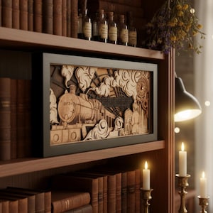 May include: A framed wooden artwork showing a detailed steam train scene. The piece is in a dark frame, displayed on a bookshelf with books. The train is depicted with billowing smoke, adding to the vintage aesthetic.