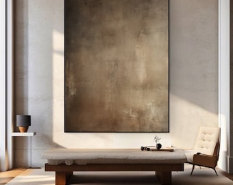 Puede incluir: Una gran pintura abstracta en tonos marrones cuelga de una pared en una sala de estar moderna. La pintura está enmarcada en negro y tiene una superficie texturizada. Un banco de madera con un cojín de color claro se encuentra frente a la pintura, y una silla con un cojín de color claro se encuentra a la derecha del banco.