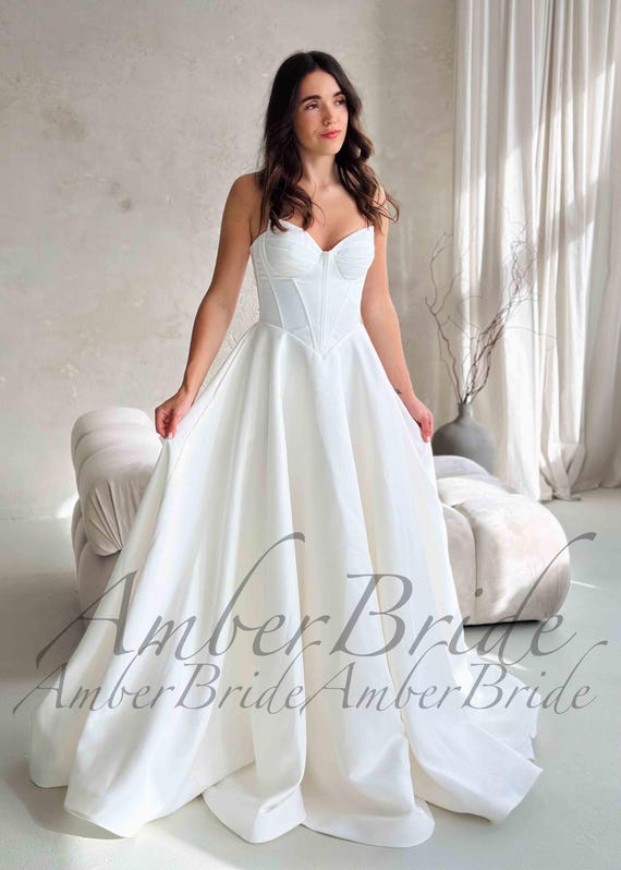 sachin and babi light blue dress The 28 Best Wedding Dresses to Consider for Every Bridal Style 2026 main image 1